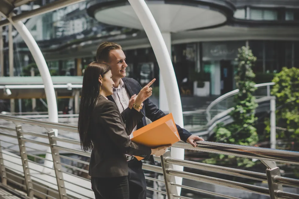 Business partners discussing opportunities in a European city