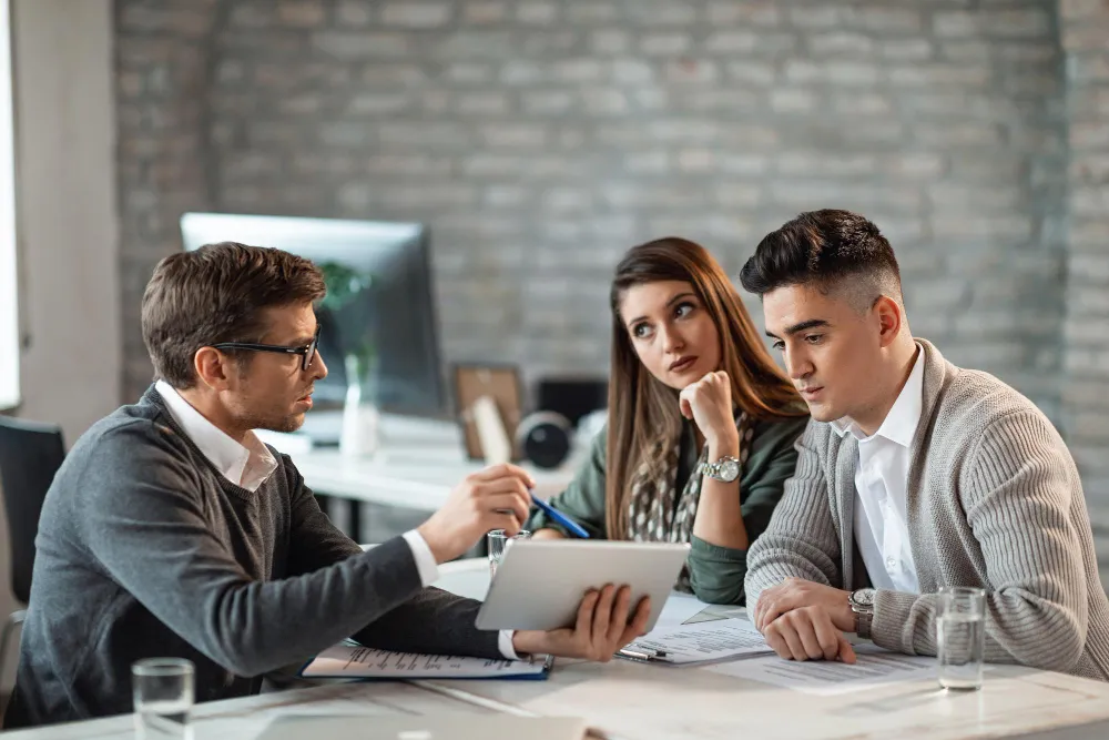 Advisor walking clients through a European growth plan